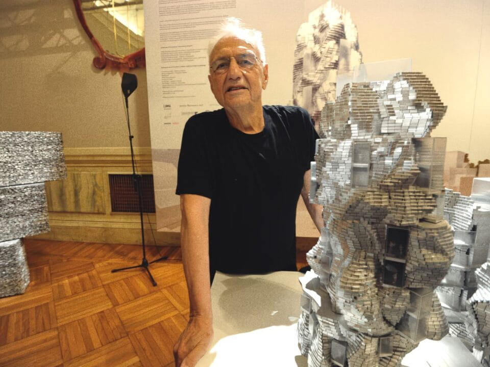 Frank Gehry’s Parc des Ateliers in Arles, showing fragmented volumes and industrial materials arranged as an open cultural complex.