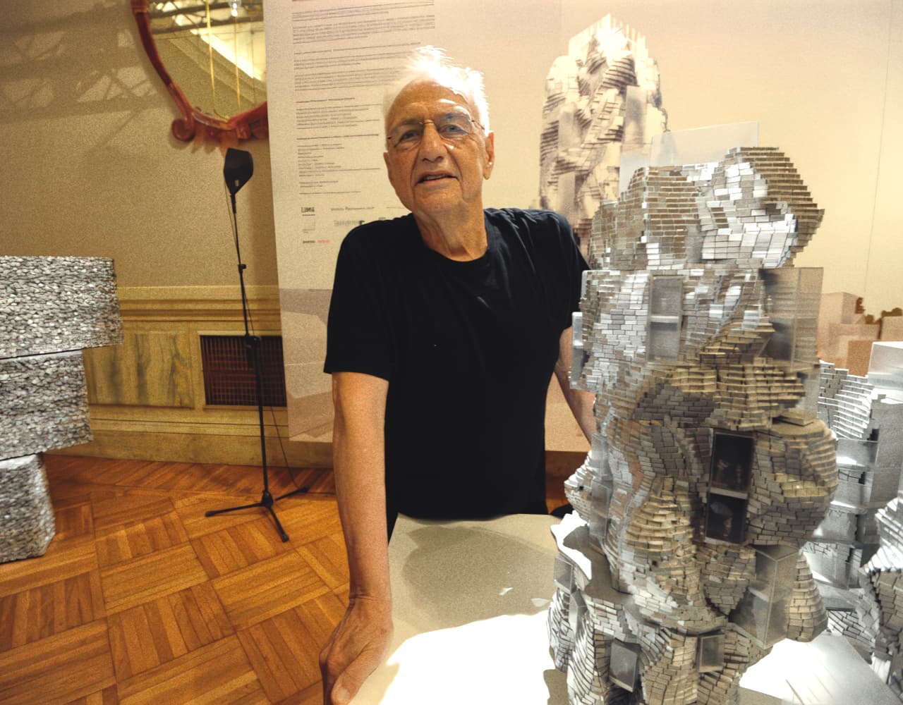 Frank Gehry’s Parc des Ateliers in Arles, showing fragmented volumes and industrial materials arranged as an open cultural complex.