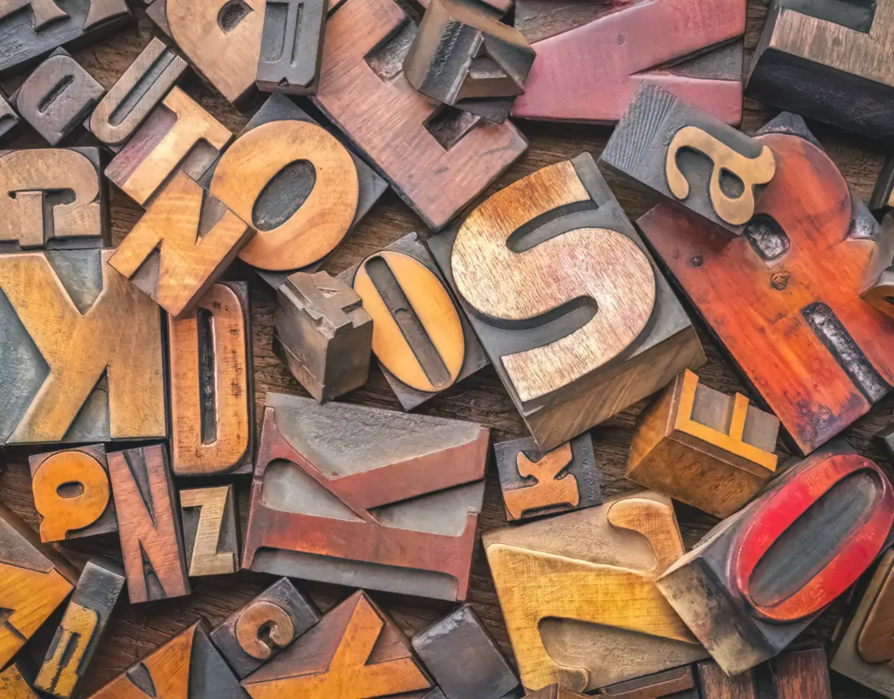 Close-up of serif letterforms showing how typography creates visual identity without relying on a logo